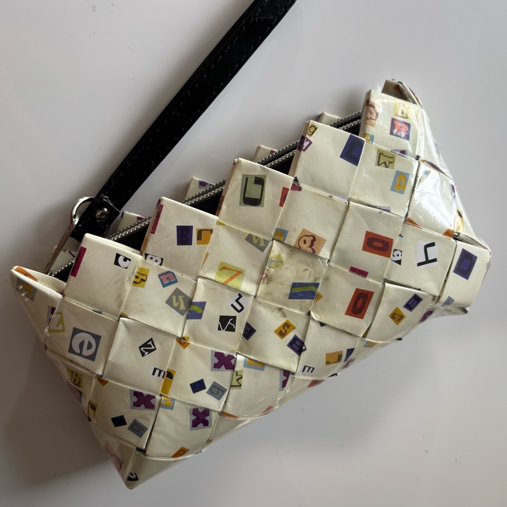 NAHUI OLLIN wrapper ALPHABET upcycled WRISTLET clutch